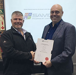 Robert Wright (RJ Connect) receiving his recognition certificate from Johan Maritz.
